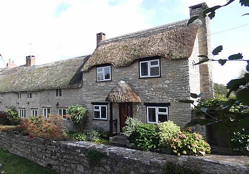 Photo Gallery Image - Thatched cottages in Queens Camel