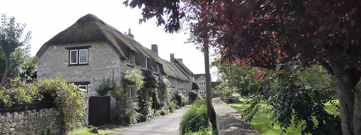 Thatched Cottages near St Barnabas Church, Queen Camel